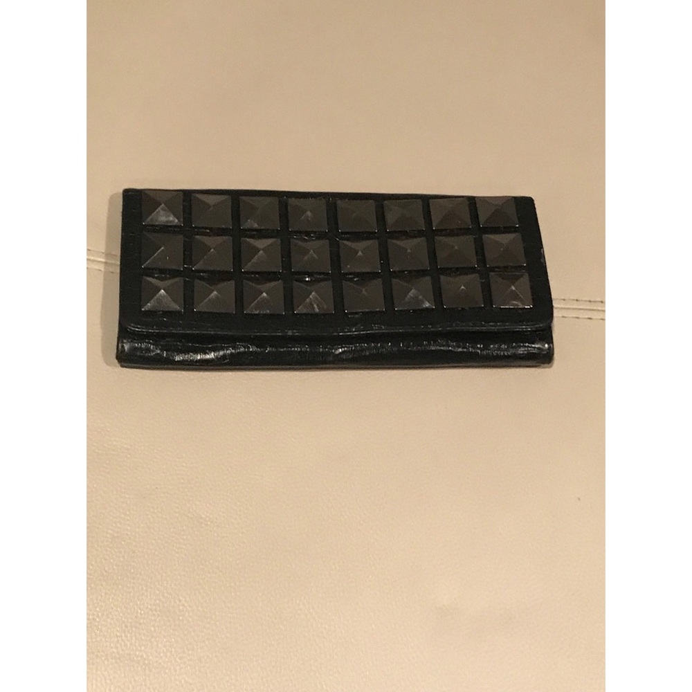 Black clutch with jumbo metal studs detailing